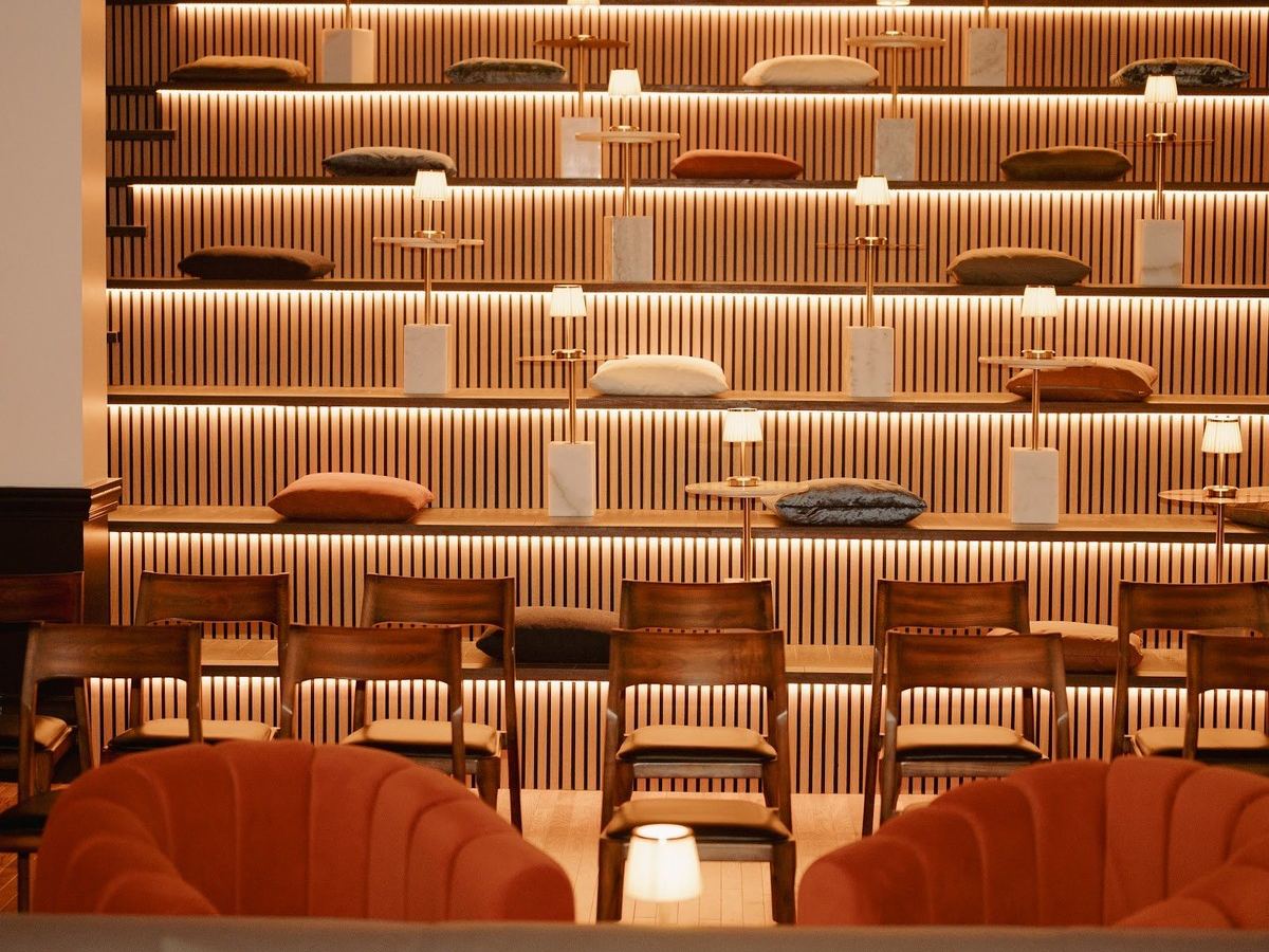 Tiered velvet seating in the Theatre at Den 1880