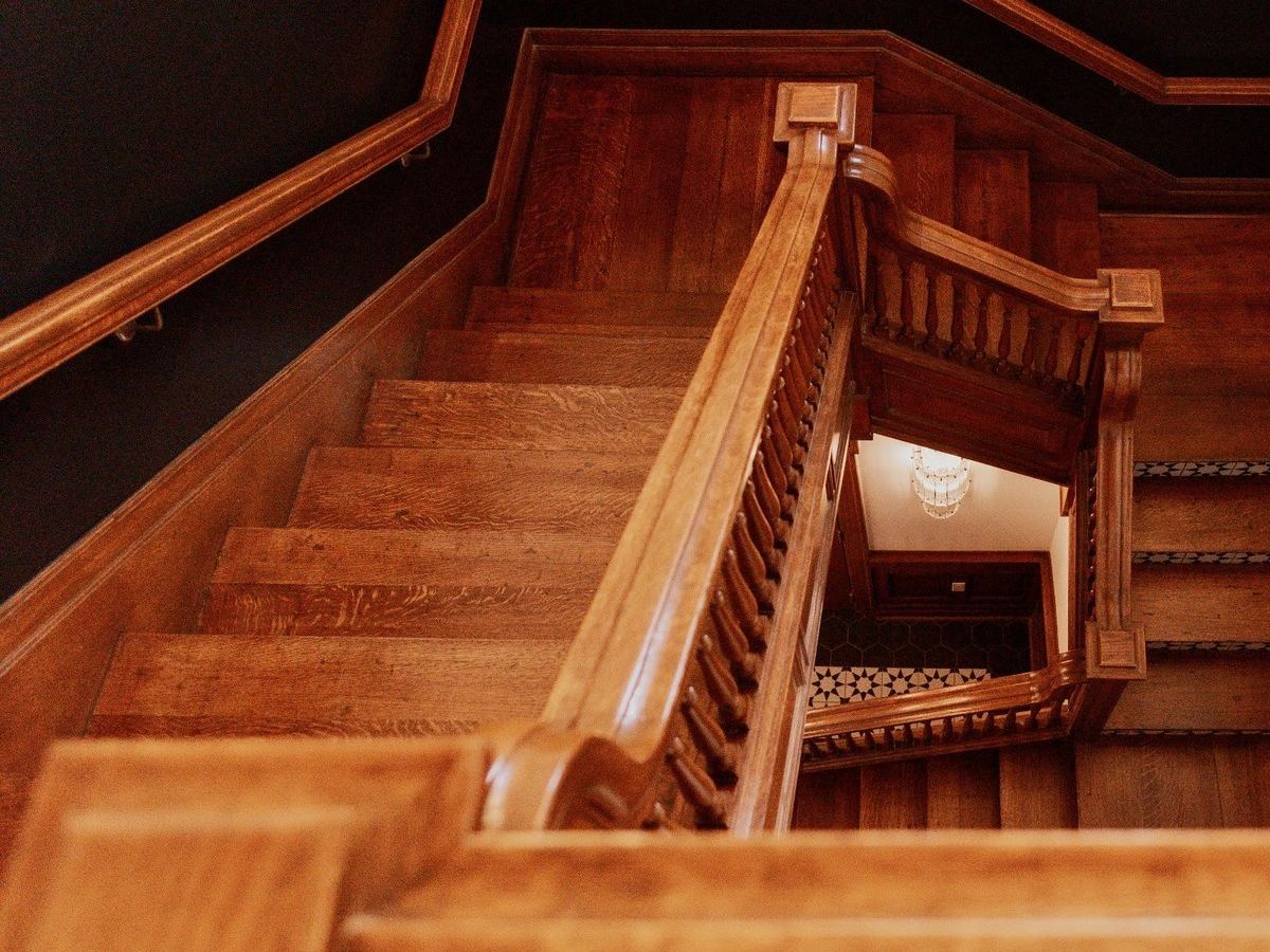 The original wooden staircase at Den 1880 seen from above