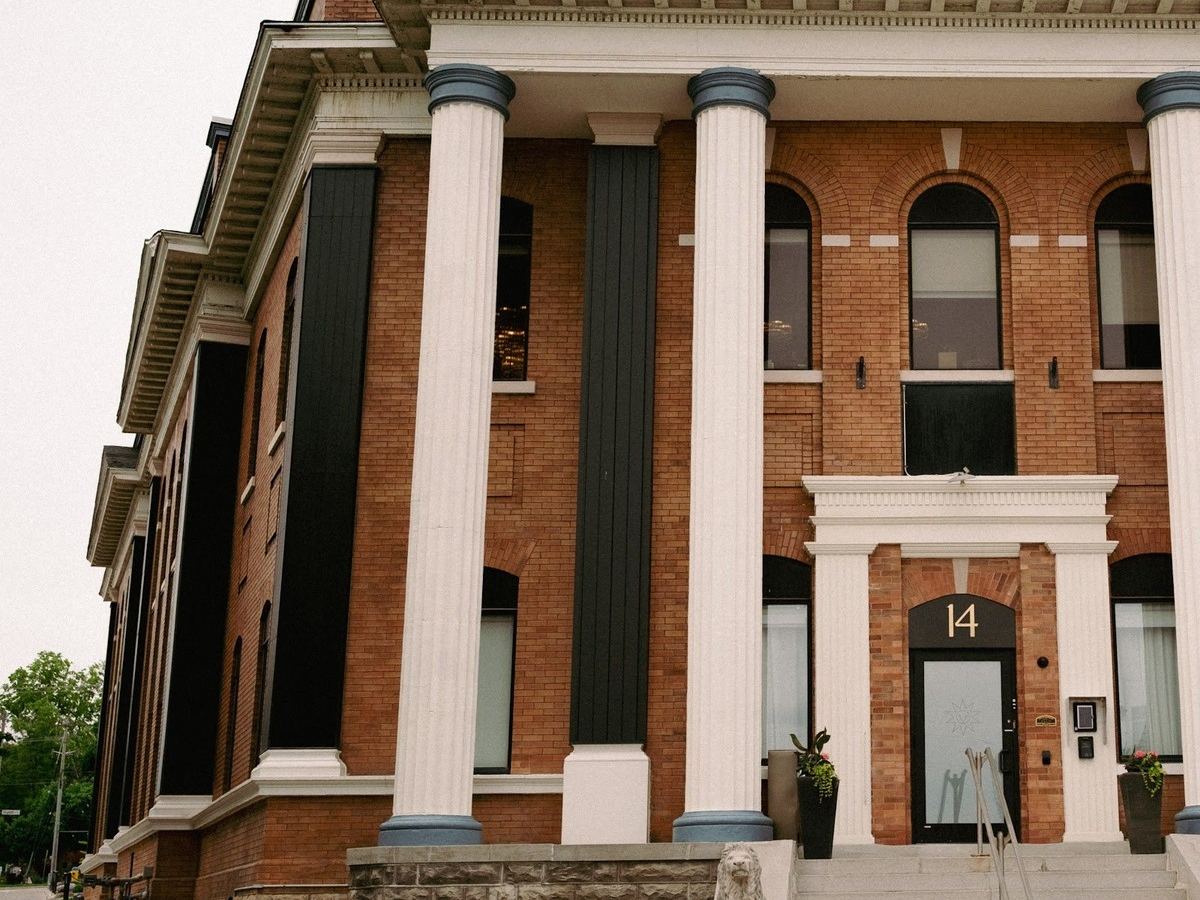 The heritage facade of Den 1880 at 14 Erb Street West