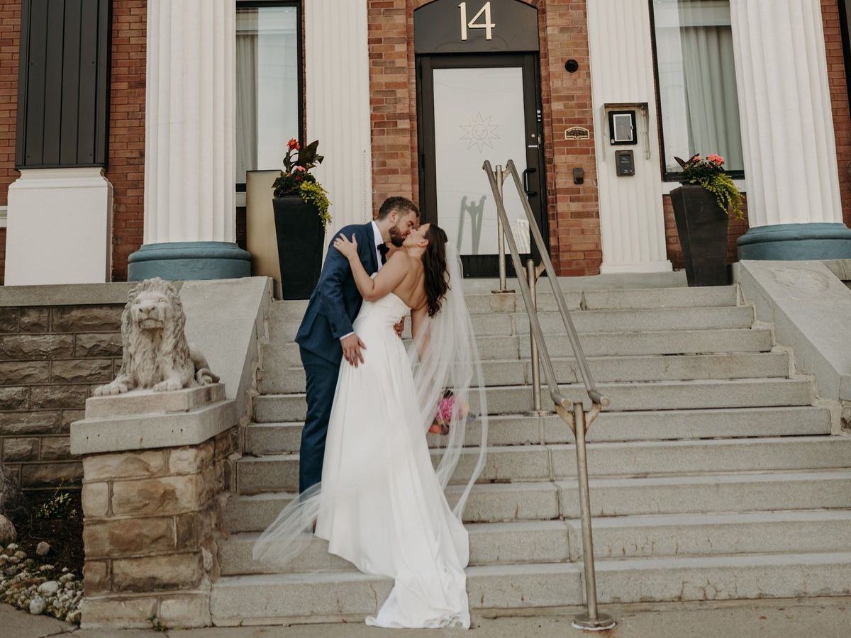 A couple on the front steps of Den 1880